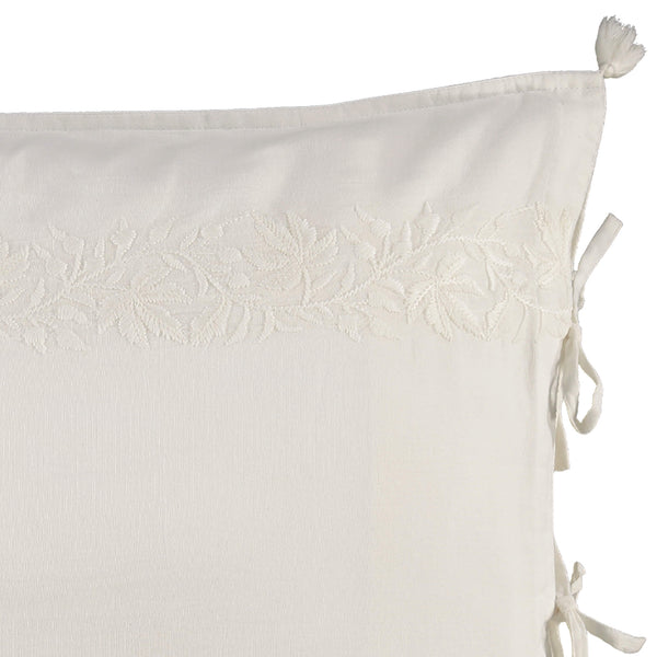 Chalk white 100% cotton pillowcase with stunning white on white ivy pattern embroidery, white tassels and hand ties to close Bedding by camomile london