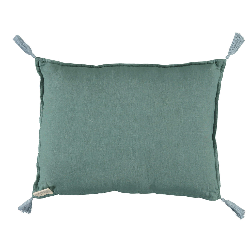 Back of a padded teal cushion by camomile london