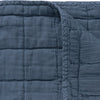 Square quilted blanket in royal navy 100% soft cotton gauze and lightly wadded comes in 4 different sizes bedding by camomile london
