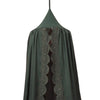 Soft cotton gauze canopy in dark green with intricate broderie anglais edging, hand cut by skilled artisans. Made by camomile london.